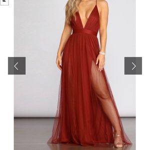 Red prom dress with 2 slits size small/medium